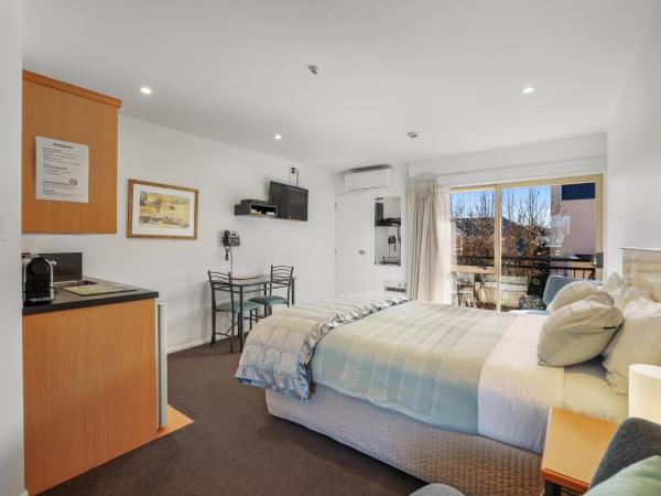 Lorenzo Motor Lodge : photo 3 de la chambre suite deluxe avec baignoire spa