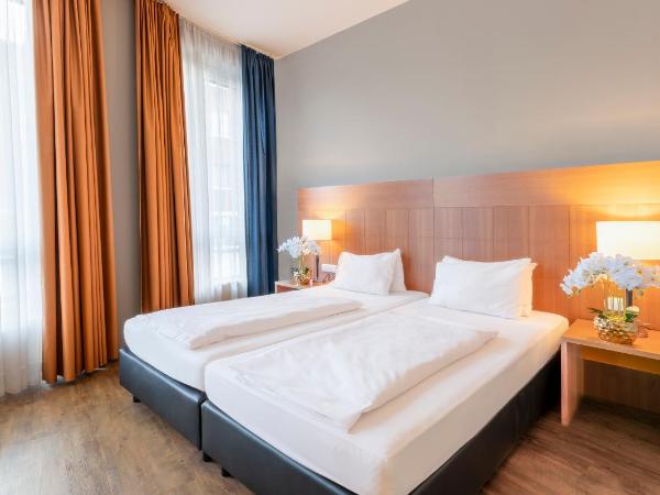 PLAZA Premium Köln : photo 1 de la chambre suite junior