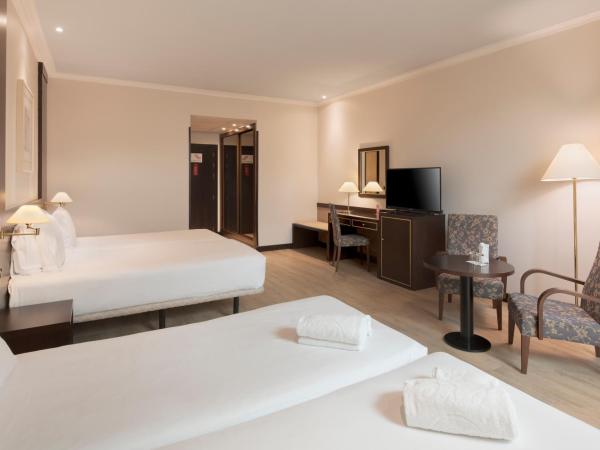 Exe Oviedo Centro : photo 2 de la chambre chambre familiale (2 adultes et 2 enfants)