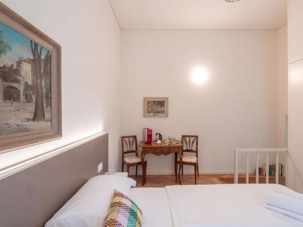 Villa by @ Home Hotel Locarno : photo 2 de la chambre chambre supérieure lit queen-size
