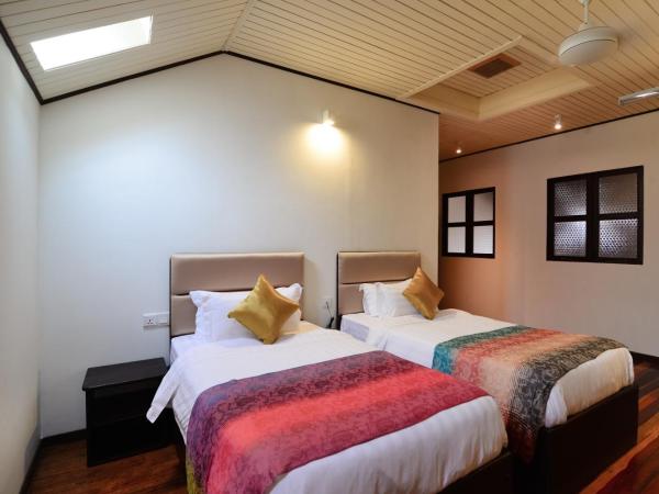 Sarang Paloh Heritage Stay : photo 1 de la chambre chambre lits jumeaux