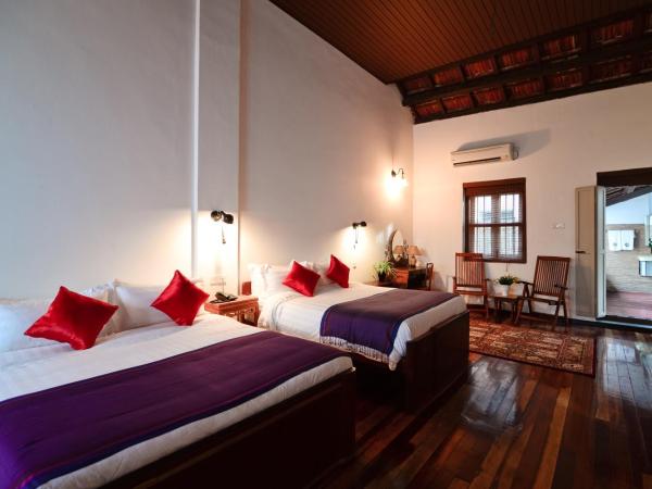 Sarang Paloh Heritage Stay : photo 3 de la chambre chambre familiale - vue sur jardin