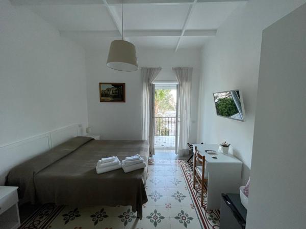 La Musa : photo 1 de la chambre chambre double ou lits jumeaux avec lit d'appoint