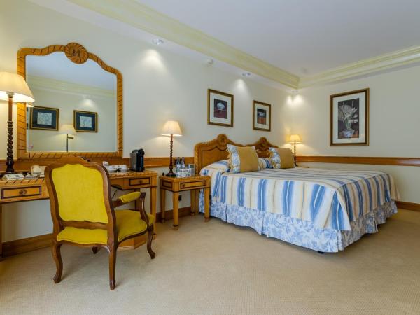 Olissippo Lapa Palace - The Leading Hotels of the World : photo 2 de la chambre chambre - vue sur piscine ou jardin