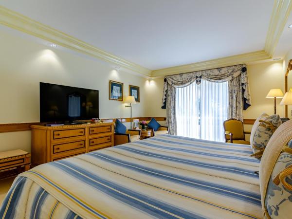 Olissippo Lapa Palace - The Leading Hotels of the World : photo 1 de la chambre chambre - vue sur piscine ou jardin
