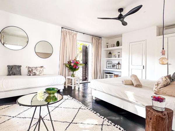 Sous le Badamier Cosy Guest House : photo 1 de la chambre chambre triple supérieure