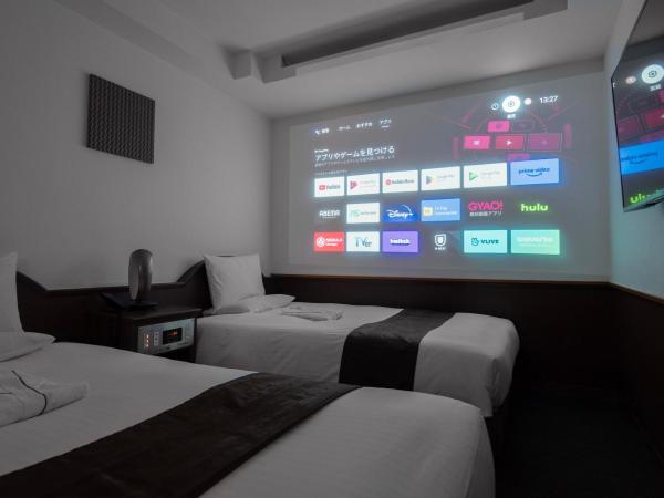 Toyo Hotel : photo 1 de la chambre chambre lits jumeaux théâtre - non-fumeurs