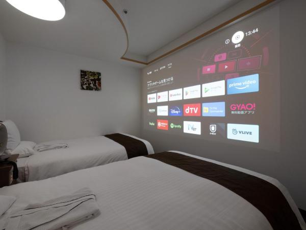 Toyo Hotel : photo 2 de la chambre chambre lits jumeaux théâtre - non-fumeurs