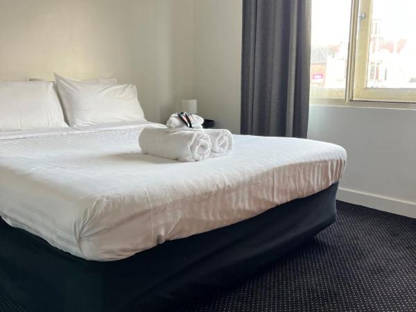 Star Bar Cafe & Hotel : photo 1 de la chambre chambre lit queen-size