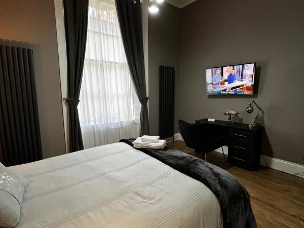 Amani Apartments - Glasgow City Centre : photo 5 de la chambre studio lit king-size deluxe