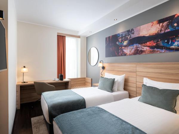 Leonardo Boutique Hotel Linz City Center : photo 1 de la chambre chambre lits jumeaux