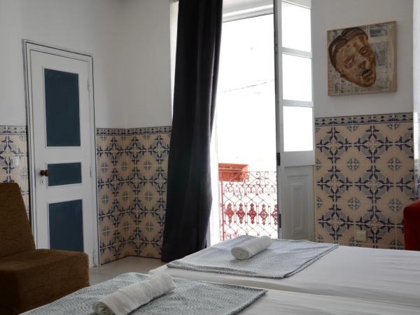 RIA Terrace : photo 4 de la chambre chambre quadruple avec salle de bains commune