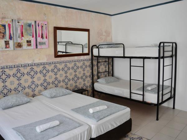 RIA Terrace : photo 1 de la chambre chambre quadruple avec salle de bains commune