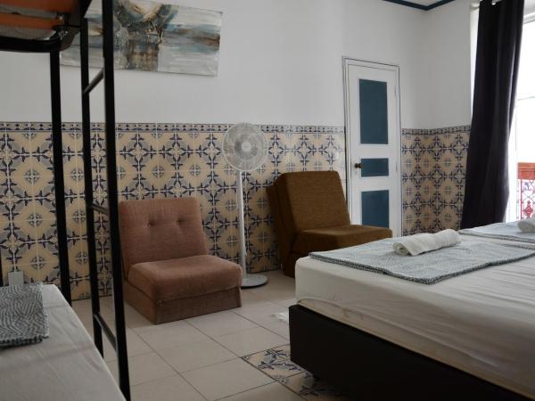 RIA Terrace : photo 2 de la chambre chambre quadruple avec salle de bains commune