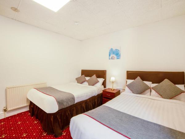 OYO The Golden Cheval Hotel & Shisha Bar : photo 1 de la chambre chambre quadruple standard
