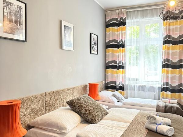 Expolis Residence - City Center MTP TARGI - 24h #betterthanyourEX : photo 5 de la chambre chambre quadruple premium