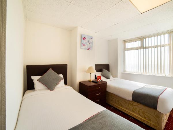 OYO The Golden Cheval Hotel & Shisha Bar : photo 7 de la chambre chambre lits jumeaux standard - vue sur mer