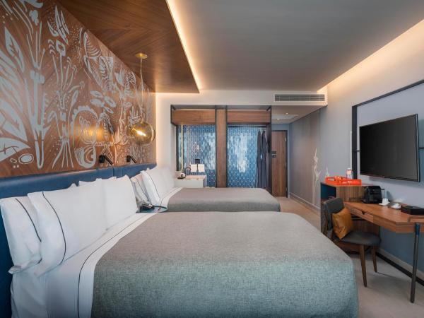 Canopy By Hilton Cancun La Isla : photo 4 de la chambre chambre premium 2 lits queen-size - vue sur coucher de soleil