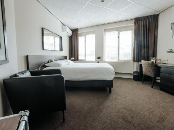 Queen Hotel : photo 3 de la chambre chambre lit king-size