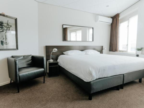 Queen Hotel : photo 8 de la chambre chambre lit king-size