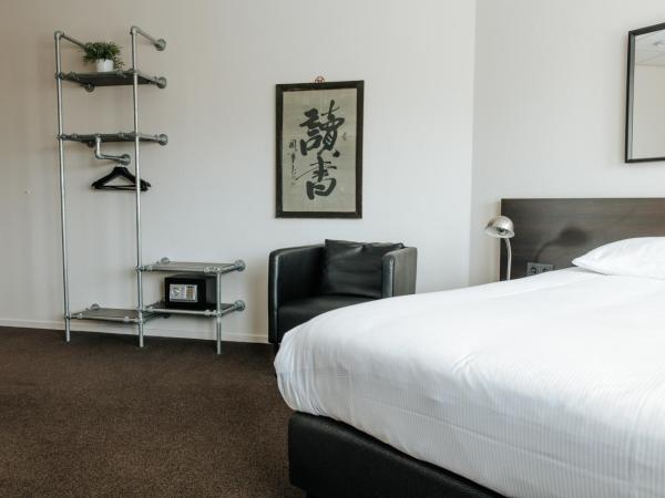 Queen Hotel : photo 7 de la chambre chambre lit king-size
