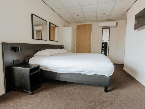Queen Hotel : photo 6 de la chambre chambre lit king-size