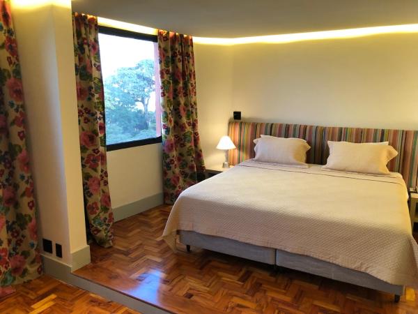 San Michel Hotel : photo 2 de la chambre suite lit king-size avec baignoire spa