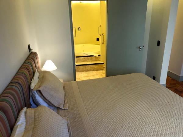 San Michel Hotel : photo 3 de la chambre suite lit king-size avec baignoire spa