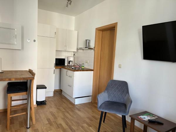 Jahrhunderthotel Leipzig : photo 2 de la chambre appartement - vue sur jardin