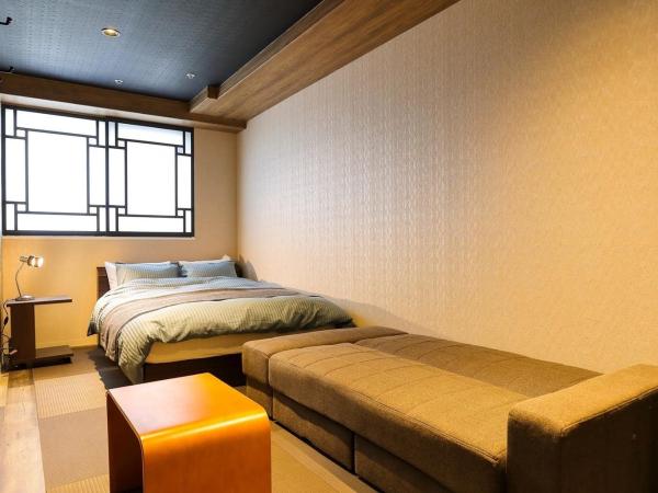 Guesthouse Kobe Nadeshikoya : photo 4 de la chambre chambre triple avec salle de bains commune