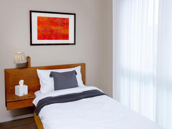 Hotel Regina -Garni Köln : photo 1 de la chambre chambre simple avec salle de bains privative