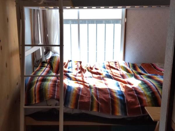 Guesthouse Oomiya base 大宮基地別荘 : photo 7 de la chambre petite chambre lits jumeaux