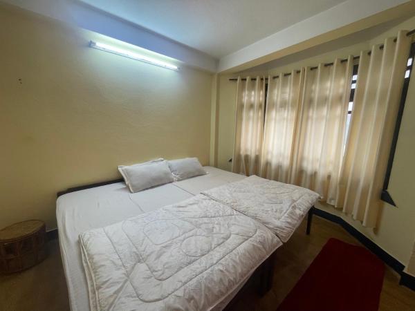 Dzambala Home : photo 2 de la chambre chambre double