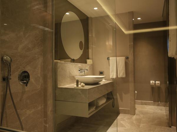 Lazzoni Hotel : photo 3 de la chambre chambre lits jumeaux de luxe avec vue sur le parc