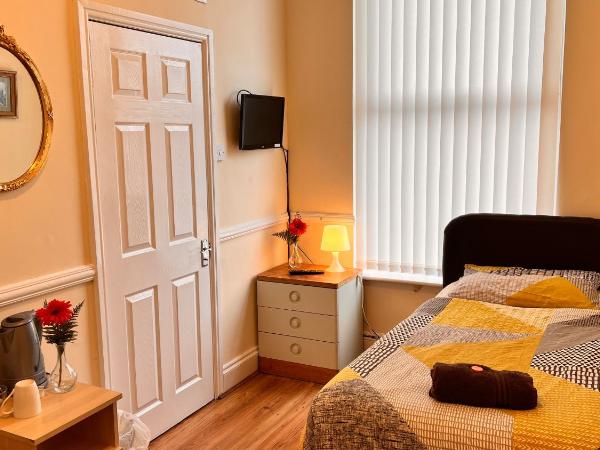 Castle Lodge Guest House 86-88 Sheil Rd L6 3AF : photo 4 de la chambre chambre simple Économique