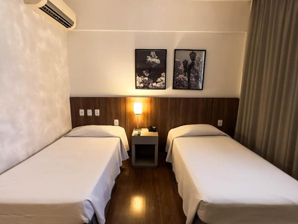Hotel Vivenzo Savassi Belo Horizonte : photo 1 de la chambre chambre lits jumeaux pour personnes à mobilité réduite