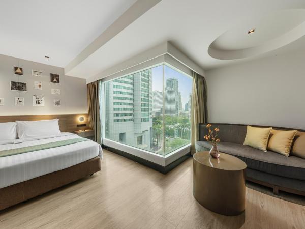 Golden Tulip Mandison Suites : photo 2 de la chambre grande chambre lit king-size deluxe