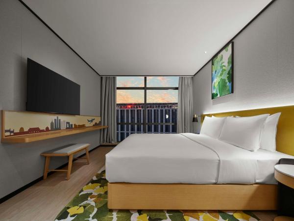 Hilton Garden Inn Beijing Daxing International Airport : photo 1 de la chambre suite deluxe avec lit king-size