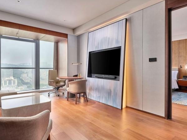 Hilton Chongqing Liangjiang New Area : photo 2 de la chambre suite deluxe avec lit king-size