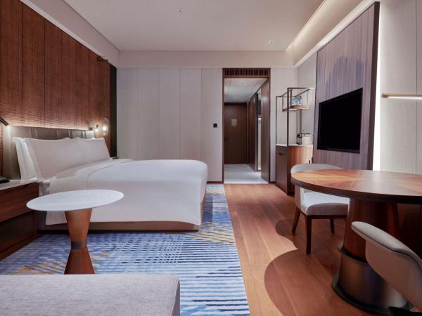 Hilton Chongqing Liangjiang New Area : photo 2 de la chambre chambre lit king-size exécutive