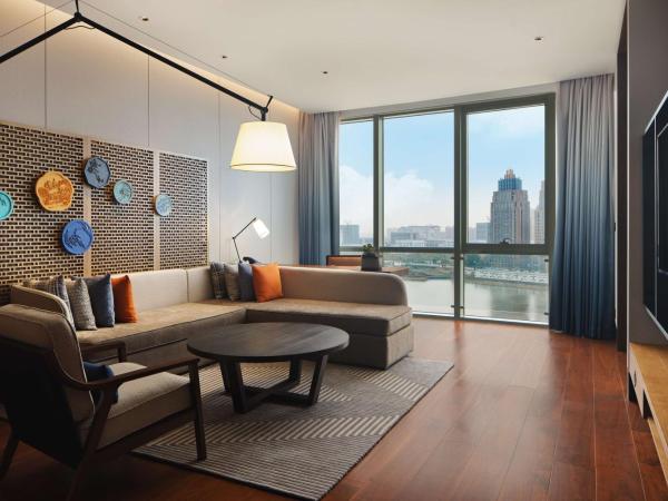 Canopy By Hilton Hangzhou Jinsha Lake : photo 2 de la chambre suite premium lit king-size - vue sur lac
