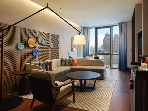 Canopy By Hilton Hangzhou Jinsha Lake : photo 3 de la chambre suite lit king-size de luxe - vue sur lac