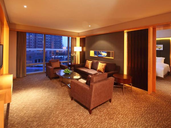 Hilton Nanjing Riverside : photo 2 de la chambre suite lit king-size premier