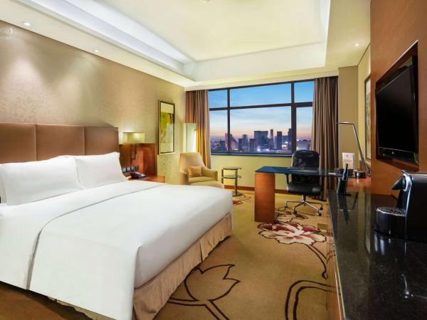 DoubleTree by Hilton Shenyang : photo 1 de la chambre chambre king exécutive avec accès au salon