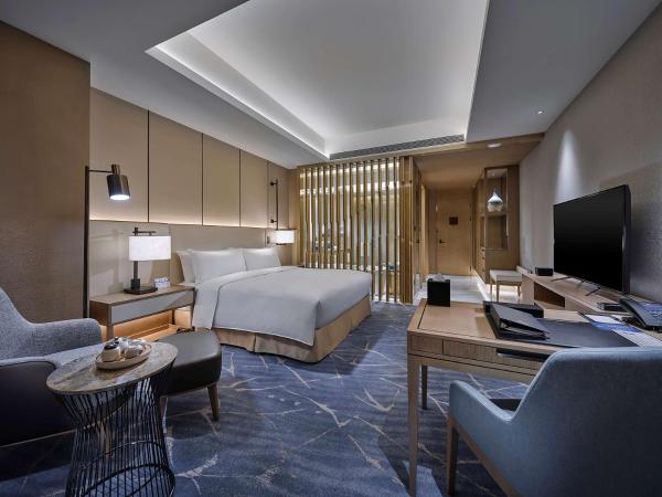 Hilton Beijing Tongzhou : photo 2 de la chambre chambre lit king-size