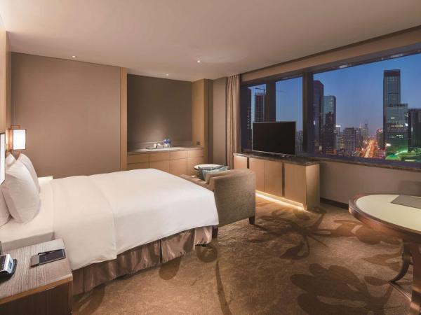 Hilton Shenyang : photo 4 de la chambre chambre exécutive deluxe avec lit king-size