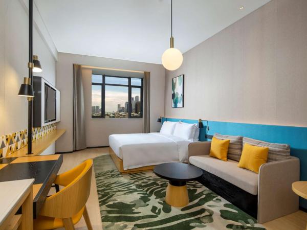 Hilton Garden Inn Shenzhen Nanshan Avenue : photo 1 de la chambre chambre lit king-size