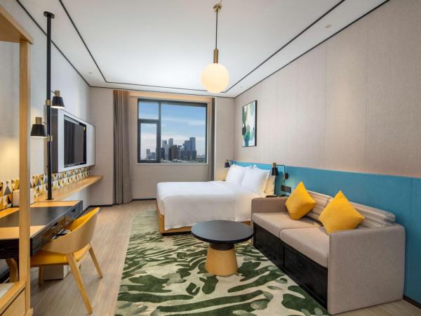 Hilton Garden Inn Shenzhen Nanshan Avenue : photo 2 de la chambre chambre lit king-size premium