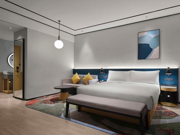 Hilton Garden Inn Tianjin Huayuan : photo 2 de la chambre chambre lit king-size deluxe