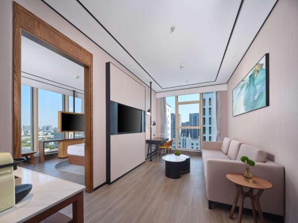 Hilton Garden Inn Hangzhou Xixi Zijingang : photo 7 de la chambre suite junior